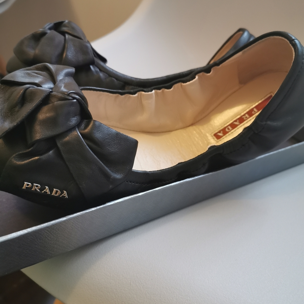 Prada bow Ballerina flats with silver hardware.